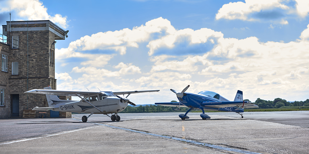 172 and Extra parked up, Cambridge Aero Club